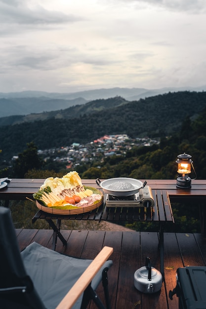 Barbecue and pan-roasted meat at rest on the mountain