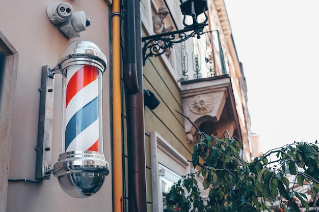 Barber shop pole Logo of the barbershop symbol Barbershop pole retro Old fashioned vintage barber shop pole A classic barber logo