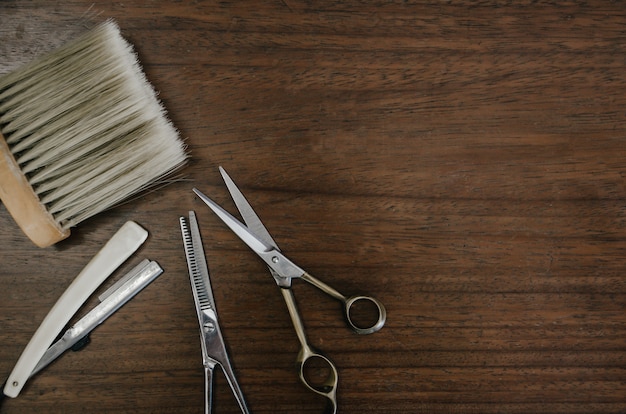 Barber tools on wooden table