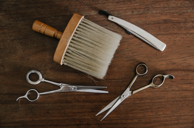 Barber tools on wooden table