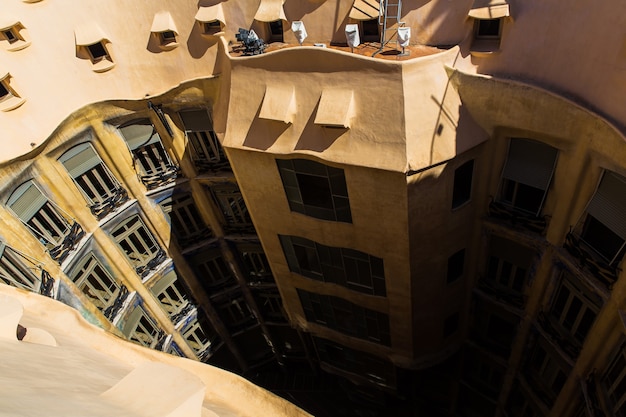 Barcelona, Catalonia, Spain, September 21, 2019. Architectural details of the roof exterior in the modernist Casa Mila, also known as La Pedrera, designed by Antonio Gaudi.