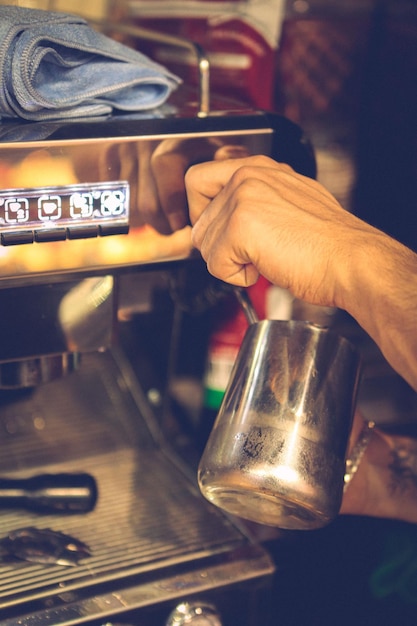 barista brewing coffee in the coffee room