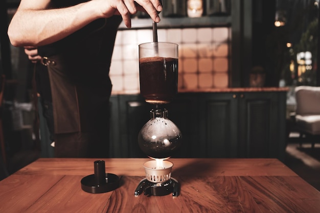 barista brewing coffee in the coffee room