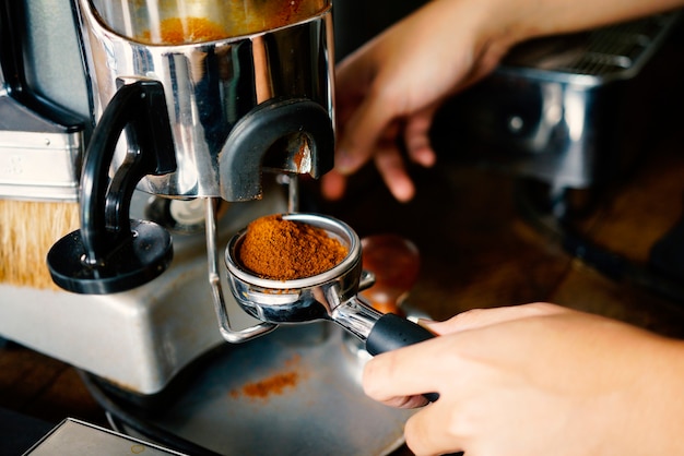 Barista making coffee.