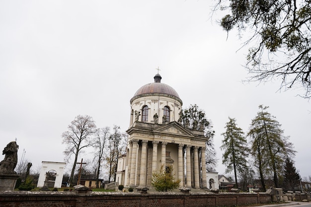 Baroque Roman Catholic church of St Joseph mid 18th century Latin on main facade TO THE GLORY OF OUR LORD GOD Pidhirtsi Lviv Oblast Ukraine