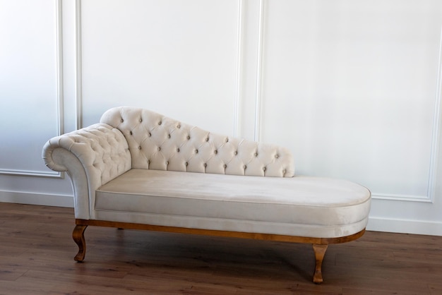 Baroque sofa Vintage furniture Pastel beige sofa with carriage screed Restoration of vintage furniture Furniture manufacturing Interior Design Soft selective focus