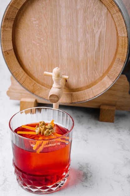 Barrel aged coffee negrony cocktail garnished with an orange peel