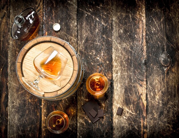 Barrel with glasses of French cognac