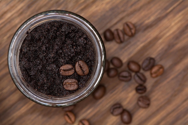 Bars of beautiful natural handmade coffee scrub on a brown wooden background