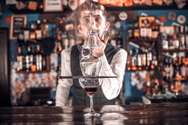 Bartender creates a cocktail in the beerhall