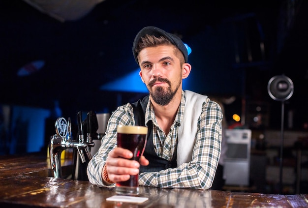 Bartender creates a cocktail at the beerhouse