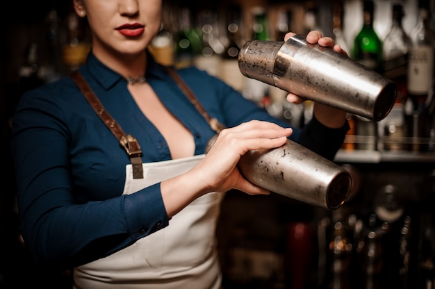 Bartender making a fresh cocktail at the bar