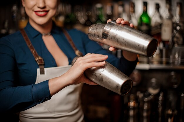 Bartender making a fresh cocktail at the bar