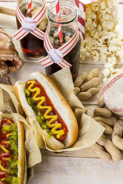 Baseball party food with balls and glove on a wood table.