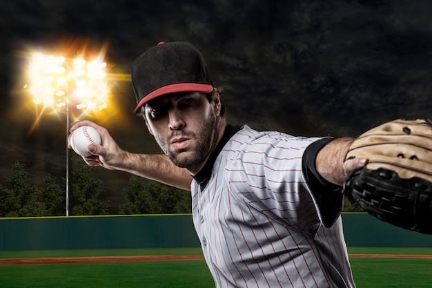 Baseball Player on a baseball Stadium.