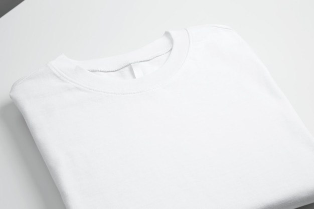 Basic folded white tshirt Mock up for branding tshirt Copy space