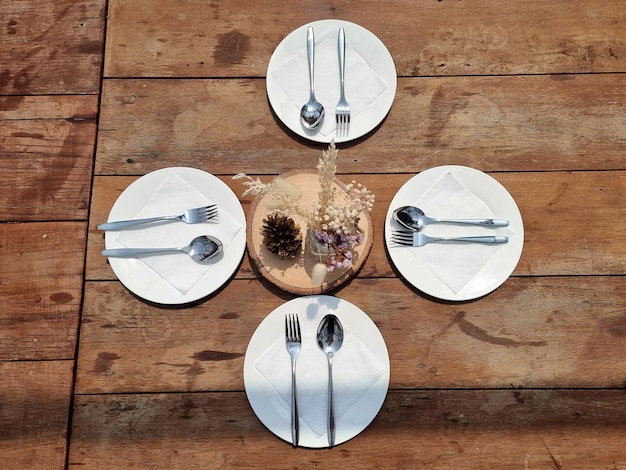 Basic table settings with equipped utensils such as plate spoon and fork