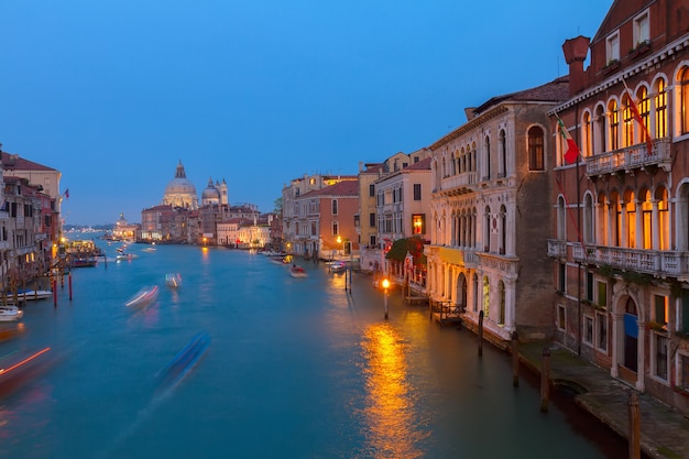 Basilica Santa Maria della Salute and Grand Canal at blue at night, Venice, Italy