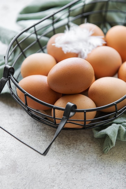 Basket of fresh brown eggs