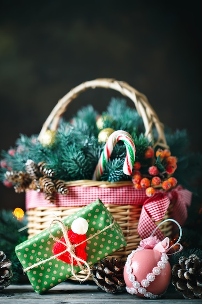  Basket with Christmas balls and Christmas gifts 