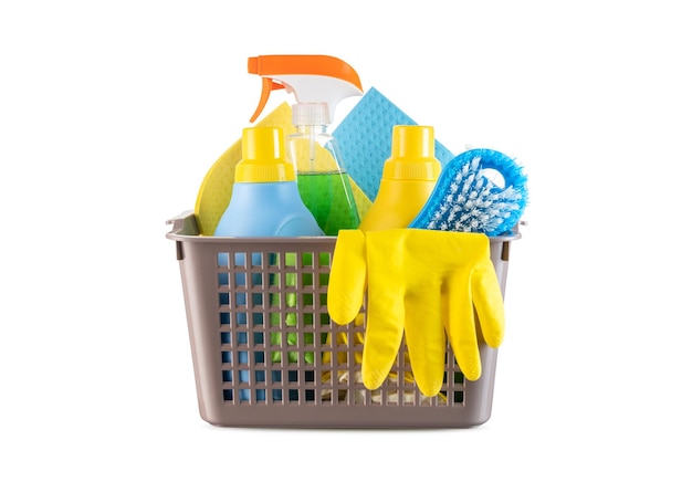 Basket with different cleaning products and tools on white background