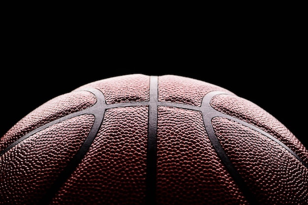 Basketball ball on black background