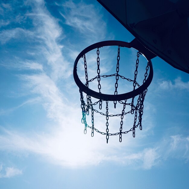 basketball hoop and blue sky in the street                       