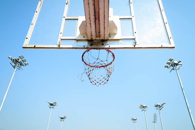 Basketball hoop in the blue sky