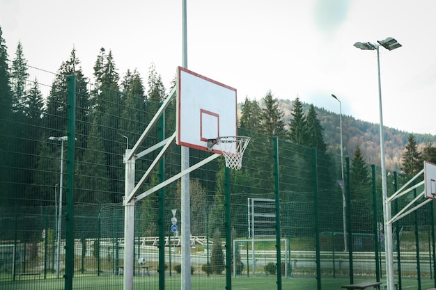 Basketball hoop in playground in Carpathian mountains