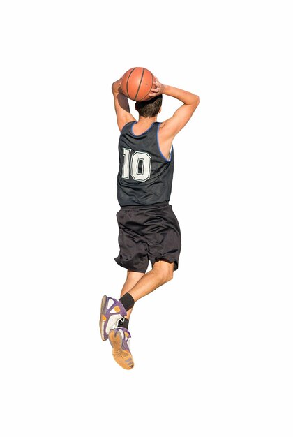 Basketball player dunking on white background