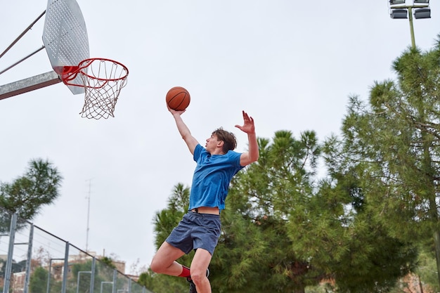 Basketball player making a dunk