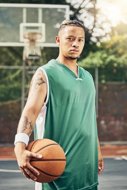 Basketball portrait sports game and man training for professional fitness event on court during summer African athlete with determination doing cardio during sport exercise for competition