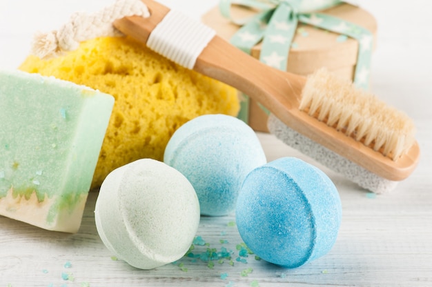 Bath accessories on white wooden table