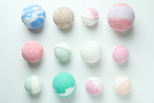 Bath balls on white background, top view