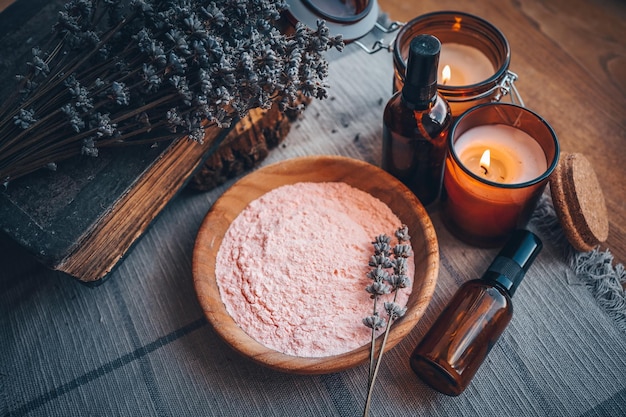 Bath powder jars with natural oils dried lavender and candles face and body care