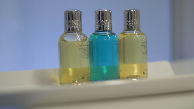 Bath set of four bottles in hotel