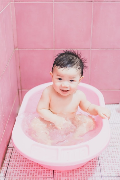 Bath time for a cute little baby