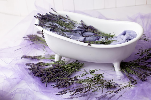 bath with lavender flowers. photo zone for a photo shoot with lavender