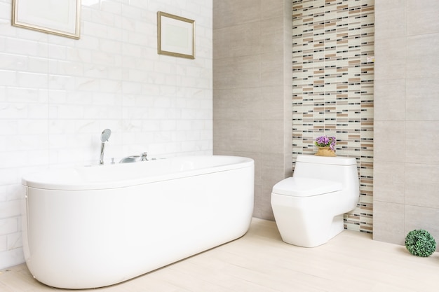 bathroom interior with minimalistic shower and lighting, white toilet