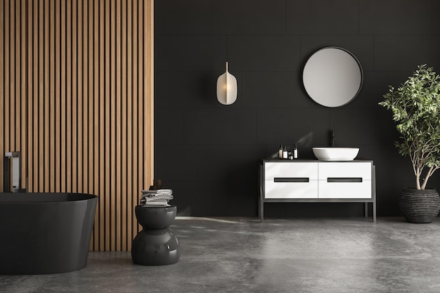 A bathroom with a black wall and a white sink with a mirror above it.