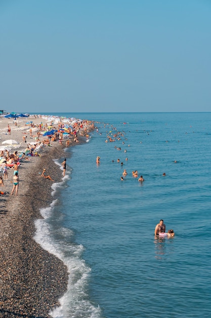 Batumi Georgia 30 August 2022 People relax on the beach in Batumi Tourism