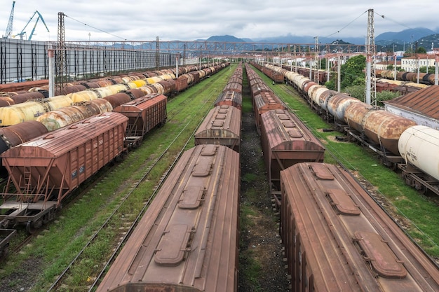 BATUMI GEORGIA SEPTEMBER 2021 long railway freight trains with lots of wagons stands on parking