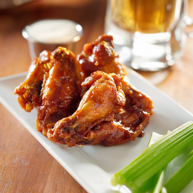 Bbq buffalo wings with celery and ranch.