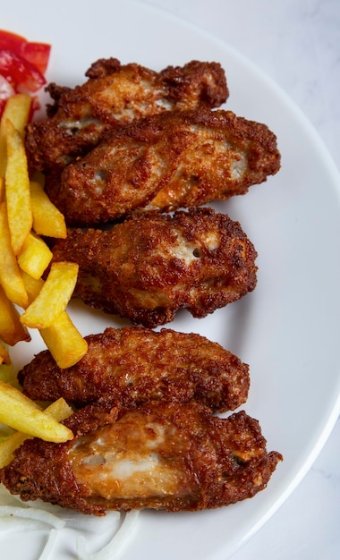 BBQ chicken wings and fries