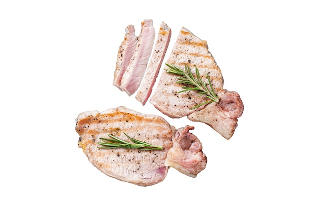 BBQ grilled pork chop steaks or cutlets sliced on wooden cutting board Isolated white background