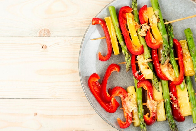 BBQ grilled vegetables on stickspace for text