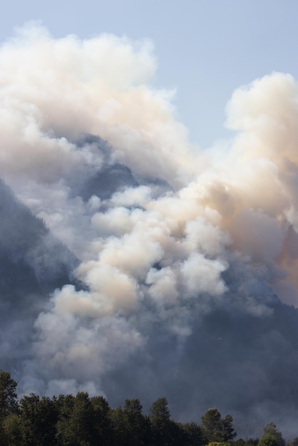 BC Forest Fire and Smoke over the mountain near Hope during a hot sunny summer day