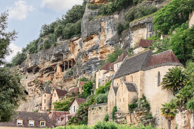 Bchapel Eglise NotreDame de La RoqueGageac is Romanesque church its roof supports limestone rock