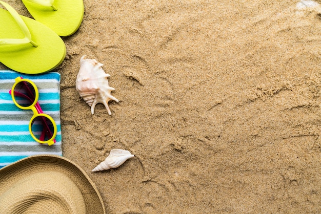 Beach Accessories On Table On Beach - Summer Holidays