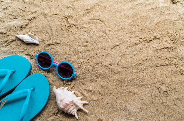 Beach Accessories On Table On Beach - Summer Holidays